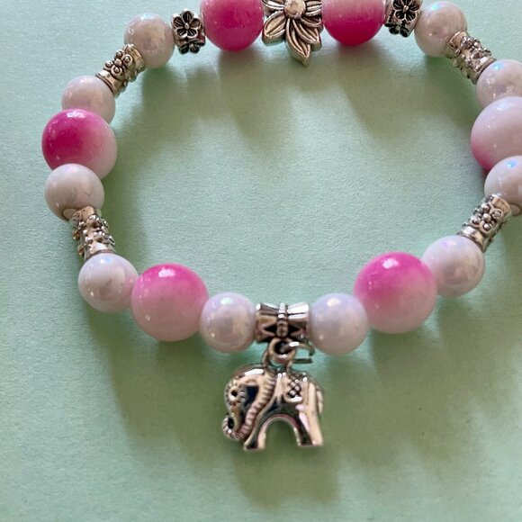Handmade bracelet with beads and dangling elephant charm - Picture 3 of 7